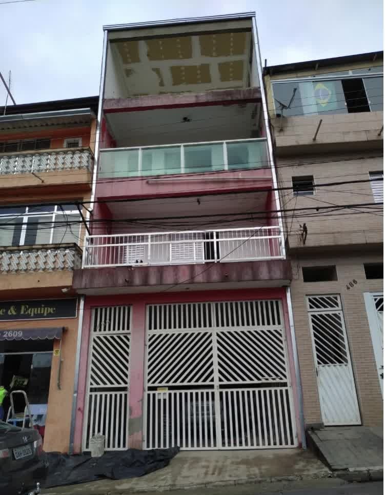 Antes: Residência — fachada renovada